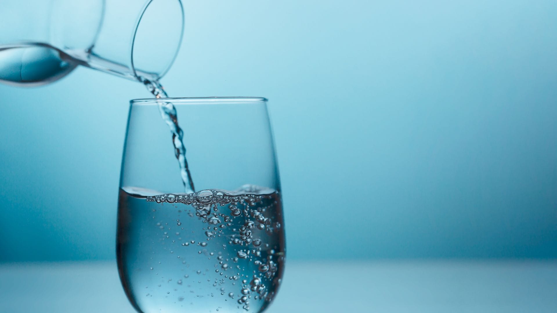 Water being poured into a glass.