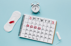 Calendar with circled dates alongside sanitary products, illustrating why some women choose to delay their period.